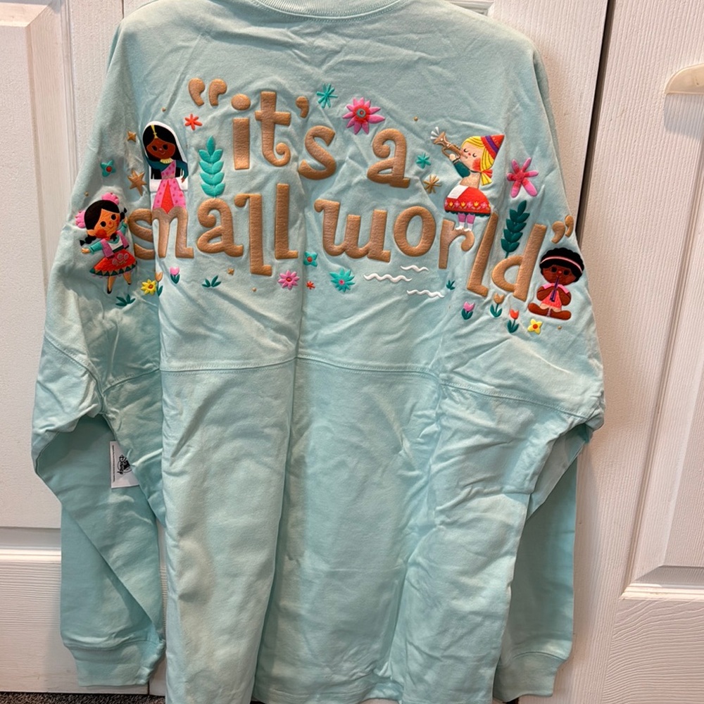 NWT It’s a Small World Spirit Jersey L - Picture 3 of 3